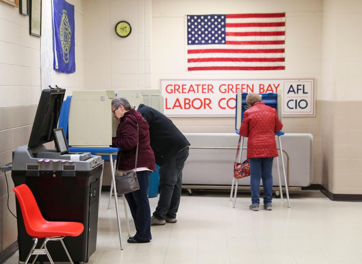 Voters fill out their ballots on Tuesday at the Green Bay Labor Temple for the spring election.