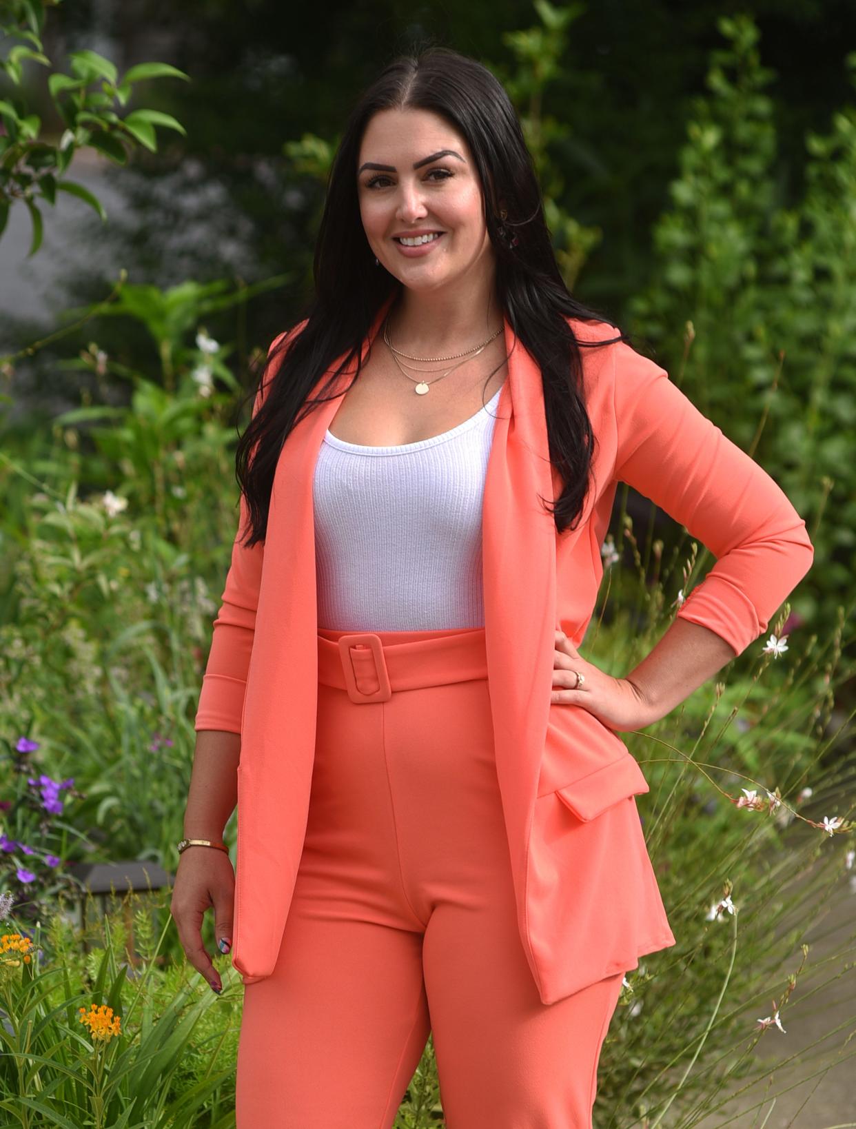 Vanessa A. Gonzalez, President/Attorney with The Law Office of Vanessa A. Gonzalez, stands next to her office in Wilmington, N.C., Wednesday, June 23, 2021. Gonzalez is one of the StarNews 40 Under 40 honorees for 2021.