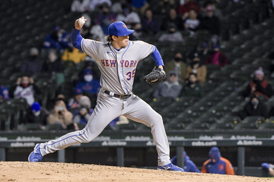 New York Mets relief pitcher Trevor Hildenberger (35) throws against the Chicago Cubs during the fifth inning of a baseball game Wednesday, April 21, 2021, in Chicago. (AP Photo/Mark Black)