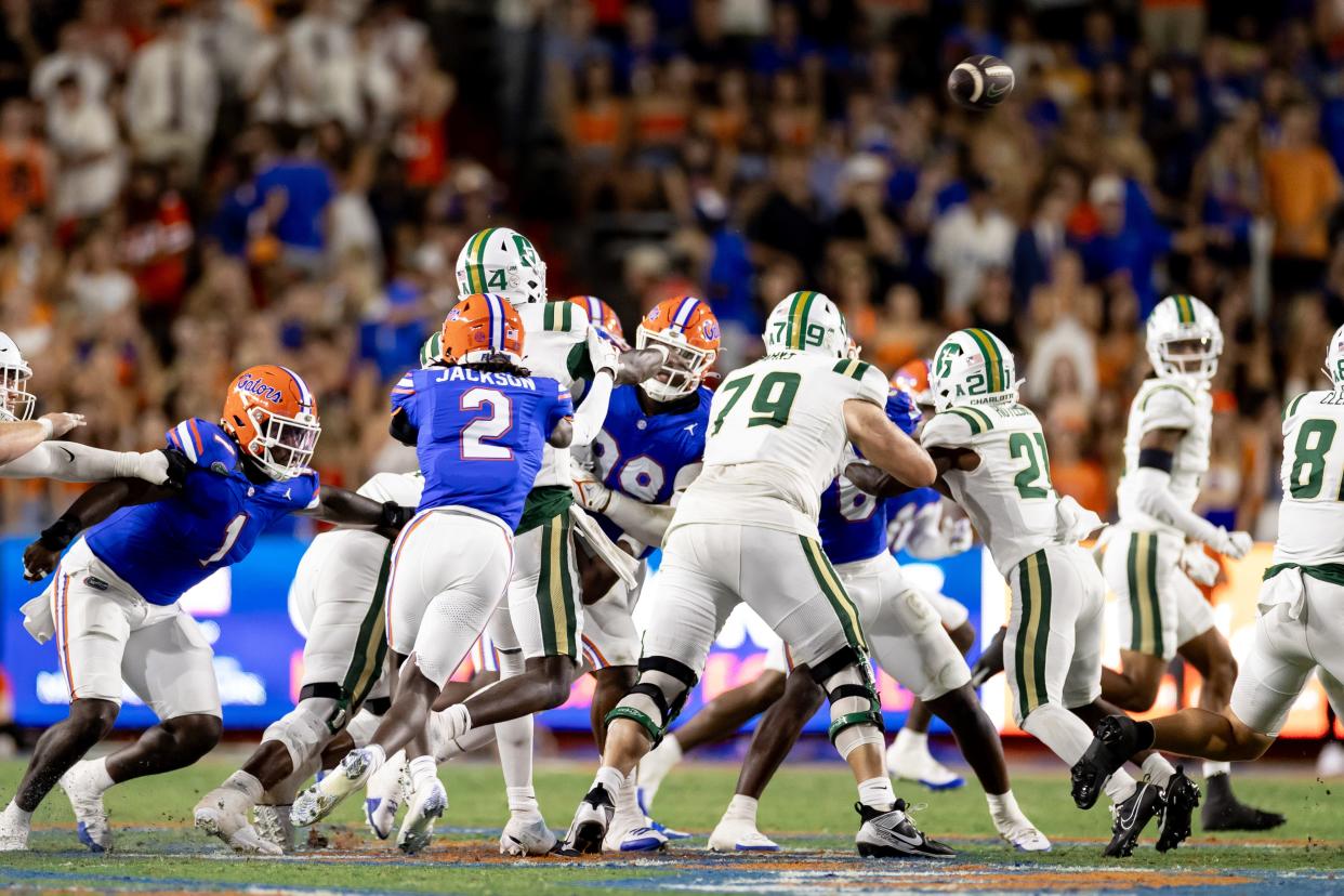 Florida Gators cornerback Ja'Keem Jackson (2) pressures Charlotte 49ers quarterback Jalon Jones (4) on the throw during the first half at Steve Spurrier Field at Ben Hill Griffin Stadium in Gainesville, FL on Saturday, September 23, 2023. [Matt Pendleton/Gainesville Sun]