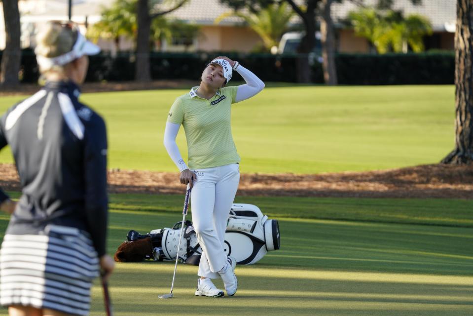 Jin Young Ko stretches during the first round of the LPGA Pelican Women's Championship golf tournament at Pelican Golf Club, Thursday, Nov. 11, 2021, in Belleair, Fla. (Martha Asencio-Rhine/Tampa Bay Times via AP)