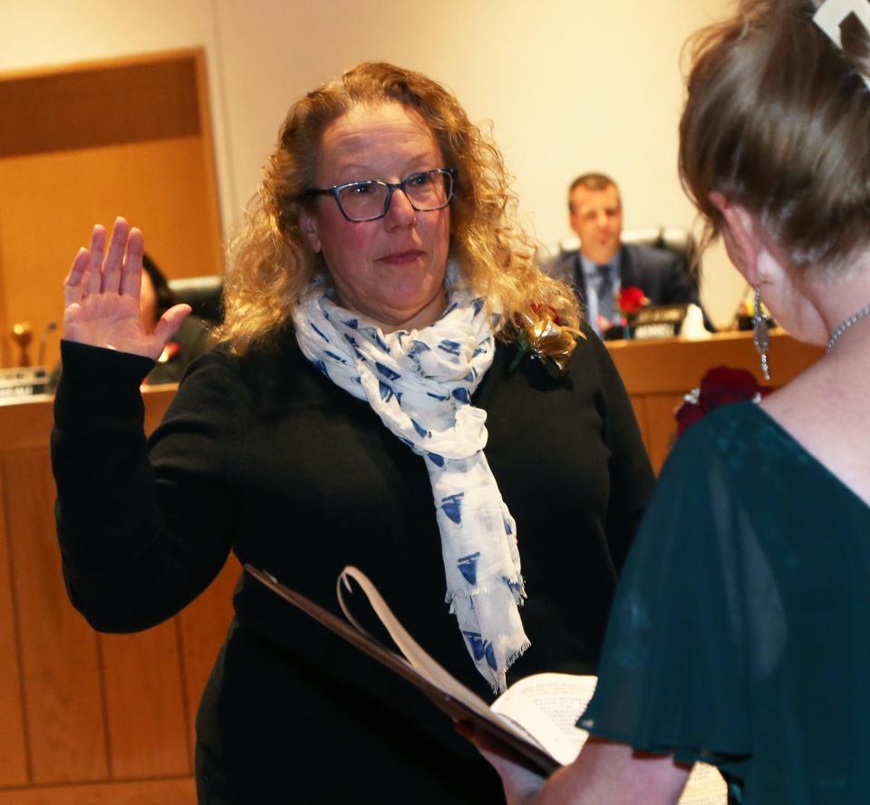 Francesca Marconi Fernald is sworn in as a member of the Portsmouth Police Commission by City Clerk Kelli Barnaby Tuesday, Jan. 2, 2024.