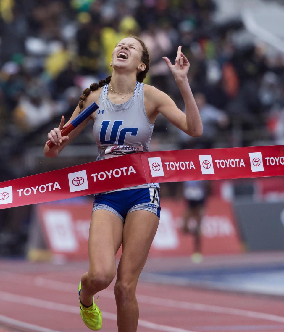 Union Catholic Peyton Hollis celebrates as she crosses the finish line and her team wins the High School Girls 4X800 Championship of America race. Day Three of Penn Relays in Philadelphia, Pa. On April  29, 2023. 