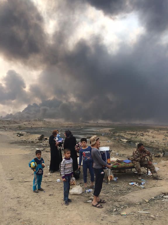 Oil wells blaze near Mosul, Iraq, spewing toxic sulfur dioxide into the air, Oct. 21, 2016.