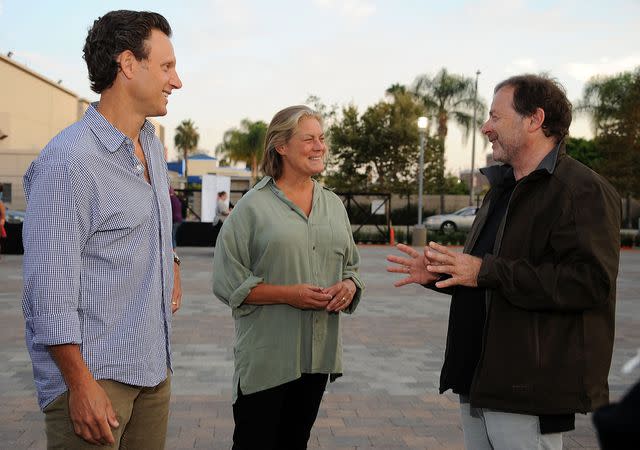 <p>Valerie Macon/Getty</p> Tony Goldwyn, Jane Musky and Steven-Charles Jaffe attend The Academy of Motion Picture Arts and Sciences' Oscars outdoors screening of "Ghost" on July 13, 2012.