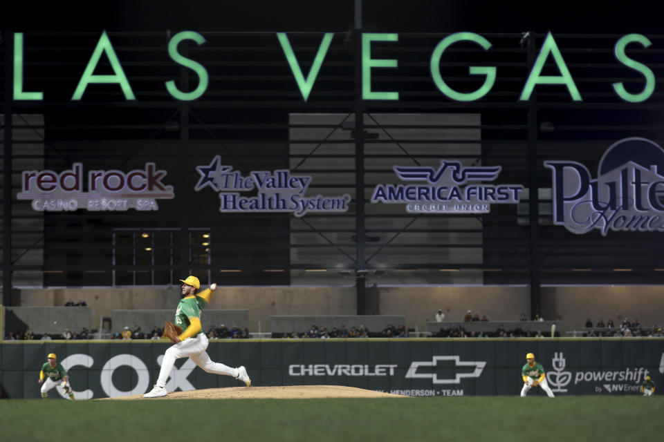 Oakland Athletics starting pitcher Mitch Spence (69) throws to a Milwaukee Brewers batter during a baseball spring training game Friday, March 8, 2024, in Las Vegas. (Ellen Schmidt/Las Vegas Review-Journal via AP)