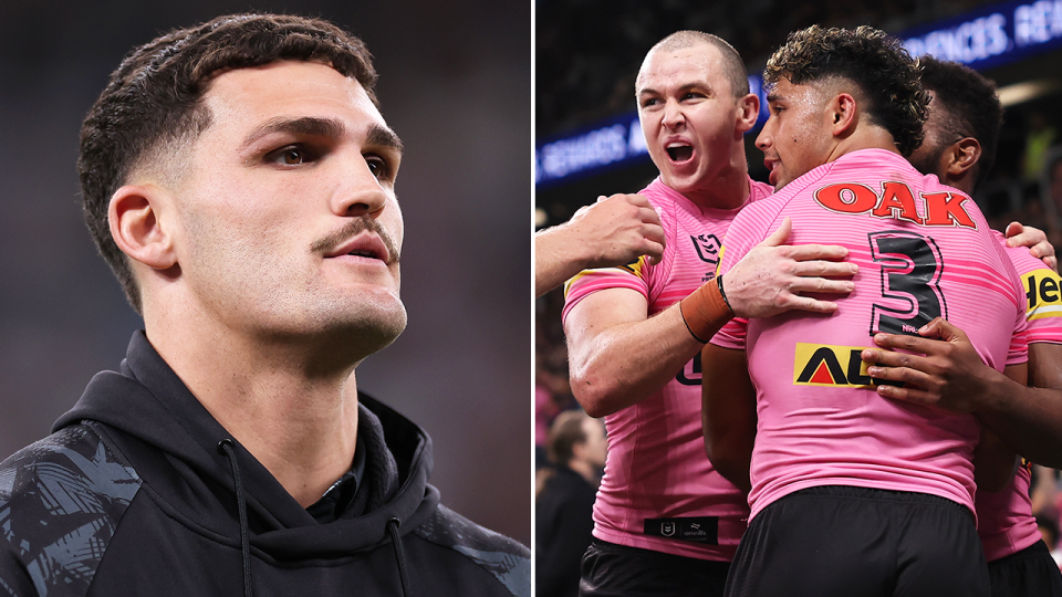 Nathan Cleary watches on as Dylan Edwards celebrates.