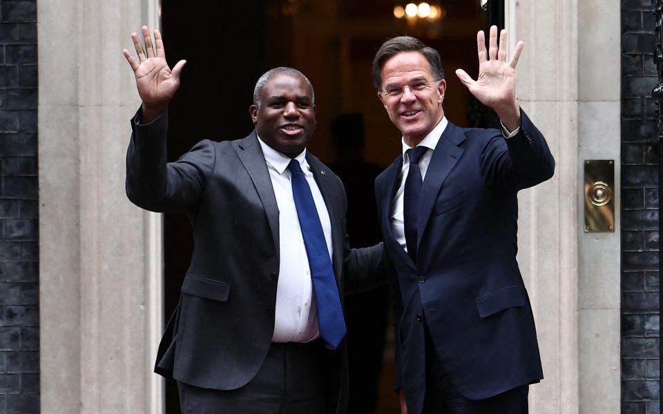 David Lammy greets Mark Rutte, the Nato secretary general, as he arrived at 10 Downing Street