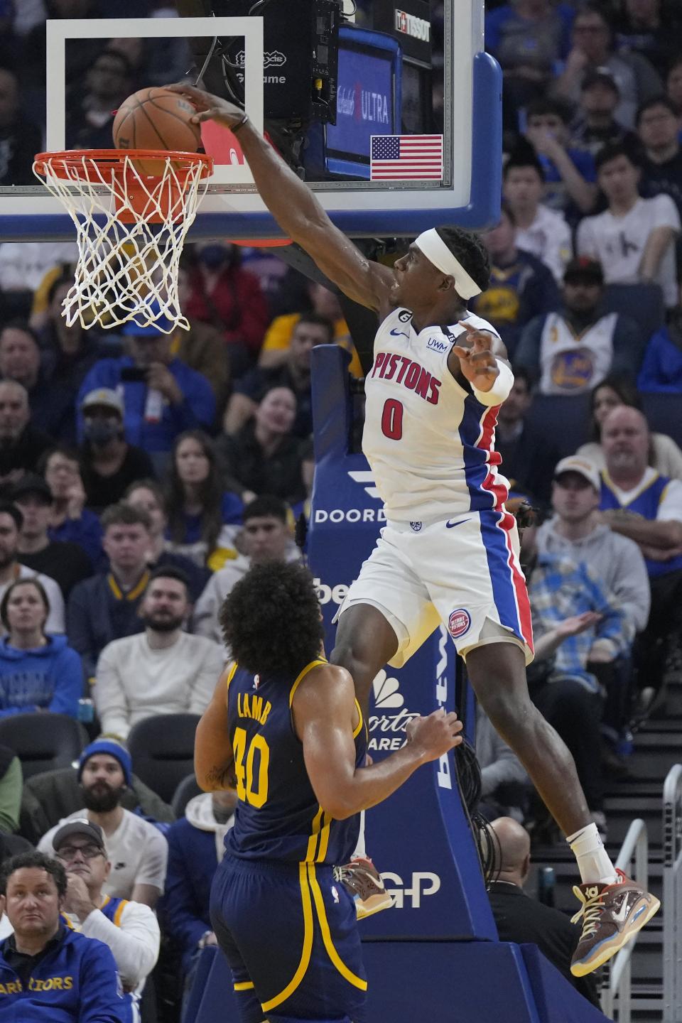 Detroit Pistons center Jalen Duren (0) dunks over Golden State Warriors forward Anthony Lamb (40) during the first half of an NBA basketball game in San Francisco, Wednesday, Jan. 4, 2023.