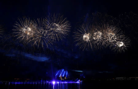 Fireworks explode over the Peter and Paul Fortress during the Scarlet Sails festivities marking school graduation, in St. Petersburg, Russia,June 24, 2018. REUTERS/Henry Romero