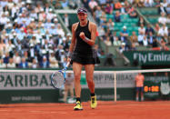 Tennis - French Open - Roland Garros, Paris, France - June 6, 2018 Spain's Garbine Muguruza reacts during her quarter final match against Russia's Maria Sharapova REUTERS/Gonzalo Fuentes