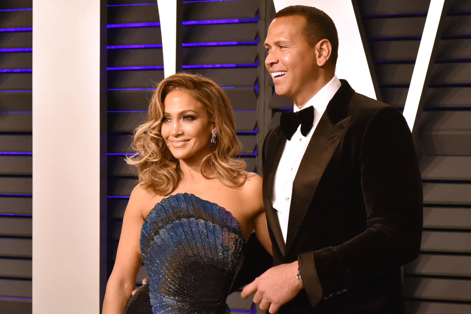 After two years of dating and endless adorable couple selfies, Alex Rodriguez and Jennifer Lopez are engaged. (Getty Images)