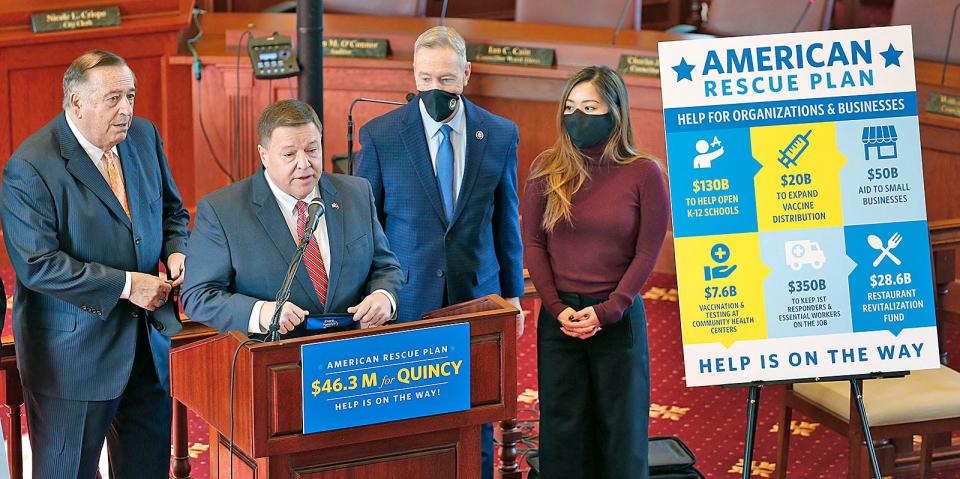 From left, House Speaker Ron Mariano, Mayor Thomas Koch, U.S. Rep. Stephen Lynch and City Council President Nina Liang tout recovery aid to Quincy in a city hall press conference on Monday, March 15, 2021.