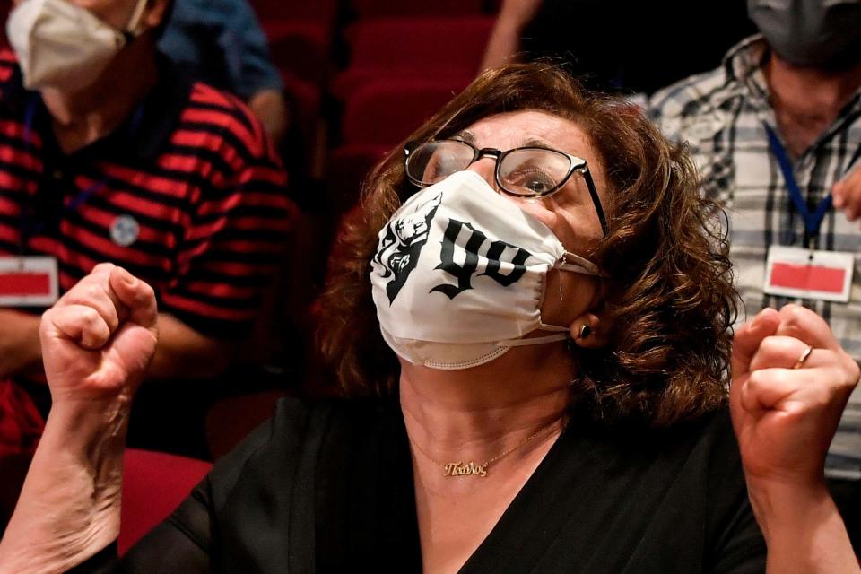 Magda Fyssa, the mother of murdered singer Pavlos Fyssas, reacts in court following the ruling concerning her son's killing (AFP via Getty Images)