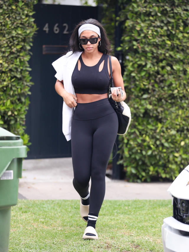 Lori Harvey Slips on Velcro Slides & GymShark Leggings for Pilates