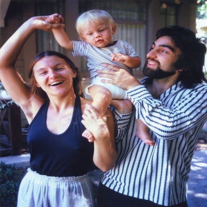 Leonardo DiCaprio, his father George DiCaprio and his mother Irmelin DiCaprio pose for a portrait outside their home in Hollywood, California, circa 1976
