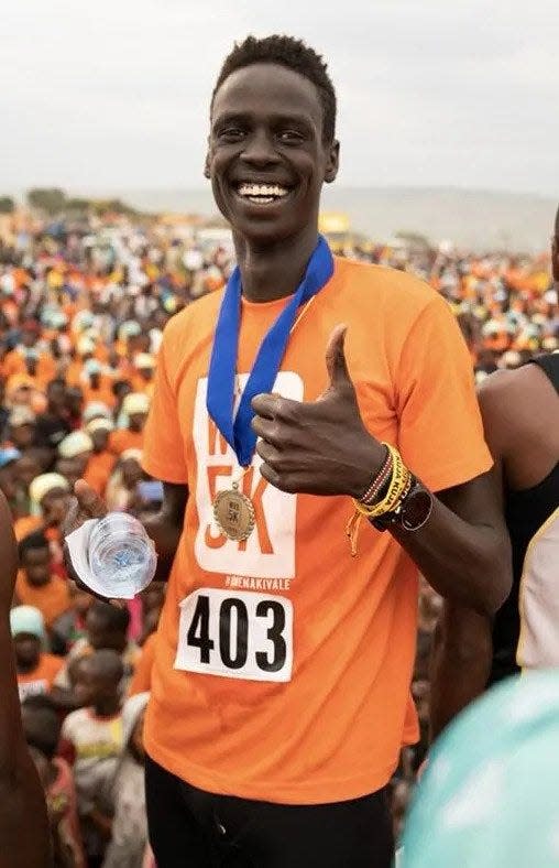 Makuach Yak was the overall winner at the World Refugee Day 5K race in Minneapolis, as seen in this file photo. Yak was found dead May 26 after he'd been missing from his Delray Beach home for six days.