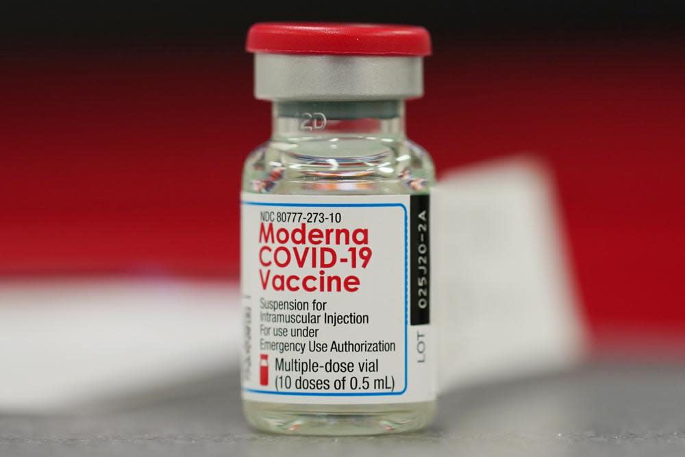 This Wednesday, Dec. 23, 2020 file photo shows a vial of the Moderna COVID-19 vaccine in the first round of staff vaccinations at a hospital in Denver. (AP Photo/David Zalubowski, File)