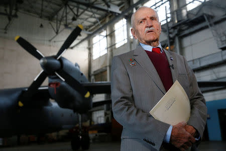 Ukrainian military pilot Mykola Volkozub, who was deployed in a team to fly a helicopter over the reactor to measure the temperature and composition of gases after the accident at the Chernobyl nuclear power plant in 1986, speaks during an interview with Reuters at the Antonov aircraft plant in Kiev, Ukraine April 6, 2018. REUTERS/Valentyn Ogirenko