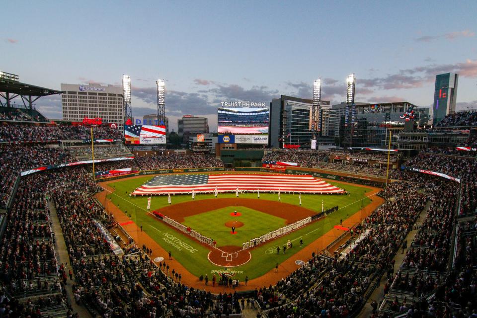 Truist Park is packed with fans for opening day in 2022 as the Atlanta Braves take on the Cincinnati Reds.