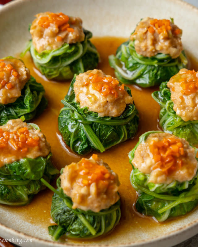 <p>Woon Heng</p><p>Dumpling wrappers are made from Napa cabbage for a lighter meal.</p><p><strong>Get the recipe:</strong> <a href="https://woonheng.com/lucky-money-bag-dumpling/" rel="nofollow noopener" target="_blank" data-ylk="slk:Lucky Money Bag Dumplings;elm:context_link;itc:0;sec:content-canvas" class="link ">Lucky Money Bag Dumplings</a></p>