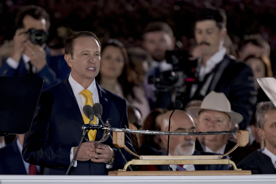 Louisiana Republican Gov. Jeff Landry speaks during his inauguration ceremony at the State Capitol building in Baton Rouge, La., Sunday, Jan. 7, 2024. The ceremony was moved because of forecasted rain on Monday, Jan. 8, the actual date Landry officially becomes governor. (AP Photo/Matthew Hinton)