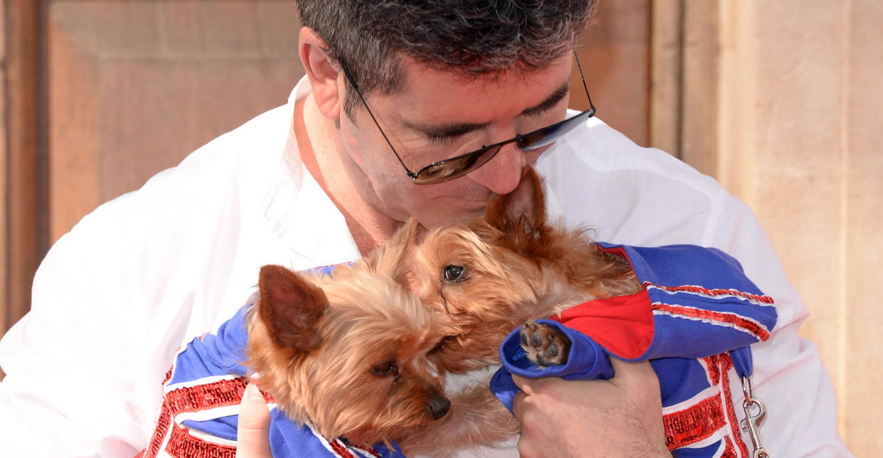 Cowell says he just can’t live without his beloved pooches.