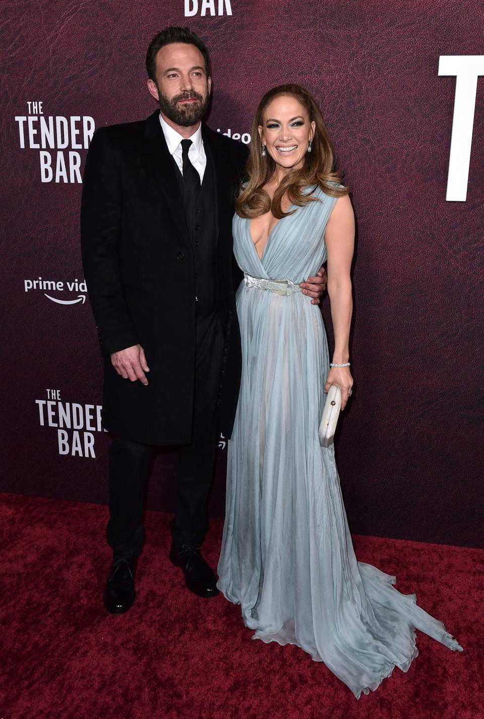 Ben Affleck and Jennifer Lopez arrive at the premiere of "The Tender Bar" on Sunday, Dec. 12, 2021.