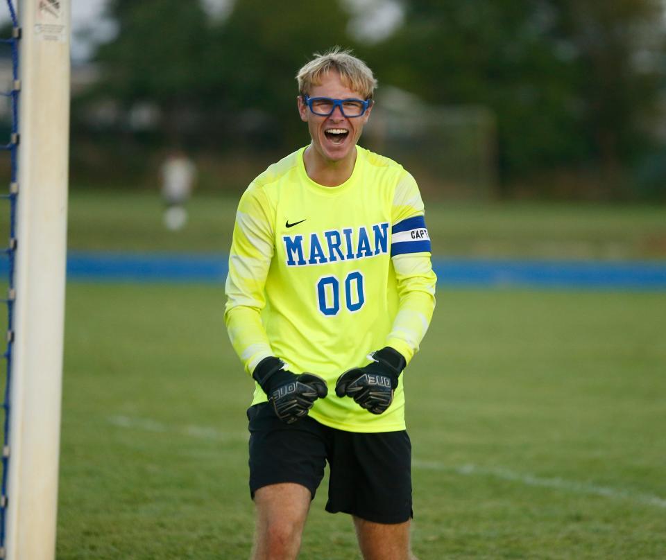 Mishawaka Marian senior goalkeeper Noah Balyeat reacts after the Knights beat Bethany Christian, 1-0, on Monday, Aug. 28, 2023, at Bethany Christian High School in Goshen. Balyeat made a save on a penalty kick attempt from the Bruins with 28 seconds left in the game to preserve the victory.