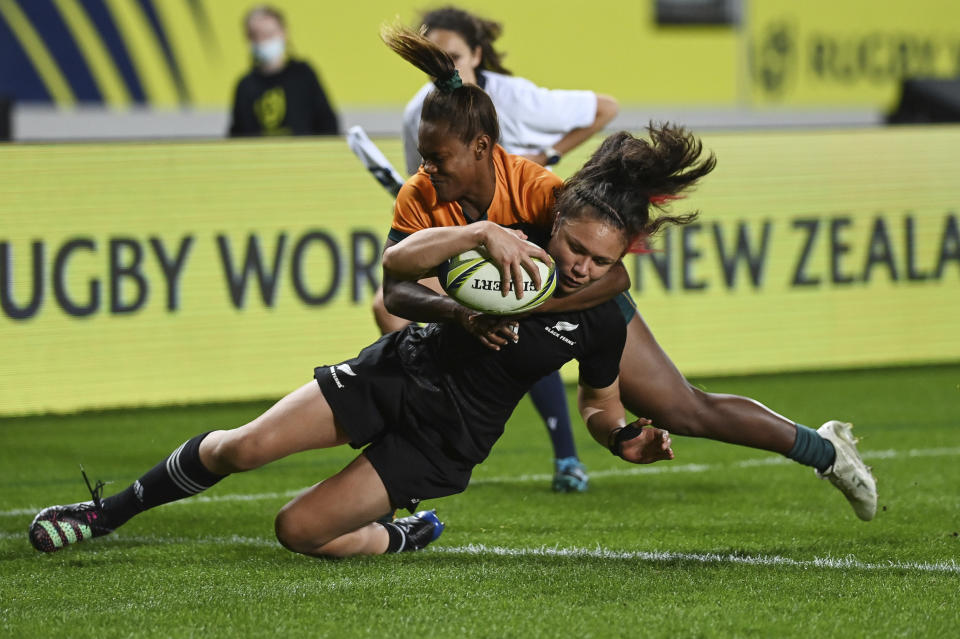 Ruby Tui of New Zealand scores a try during the Women's Rugby World Cup pool match between Australia and New Zealand, at Eden Park, Auckland, New Zealand, Saturday, Oct.8. 2022. (Andrew Cornaga/Photosport via AP)