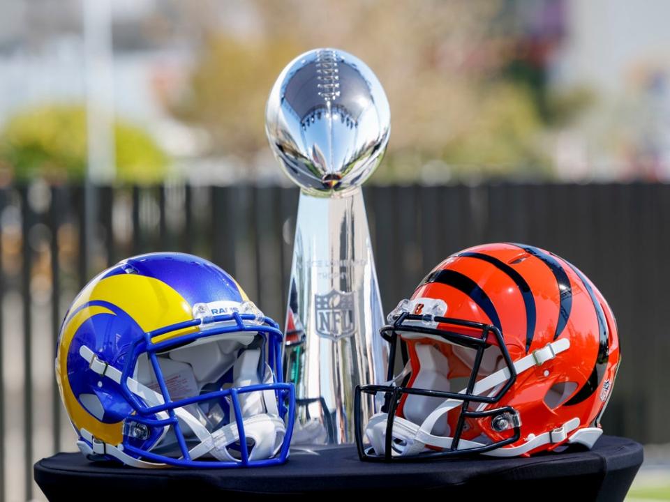 The Los Angeles Rams’ and the Cincinnati Bengals’ helmets sit in front of the Vince Lombardi Trophy (Ryan Kang/NFL)