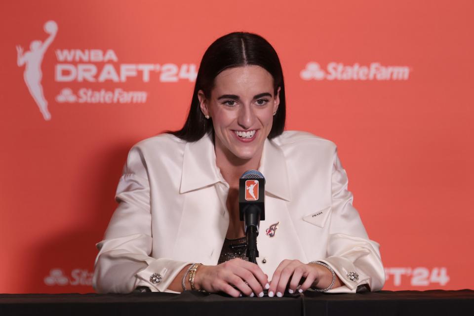 Caitlin Clark speaks in a press conference after she was selected with the first overall pick in the 2024 WNBA Draft.