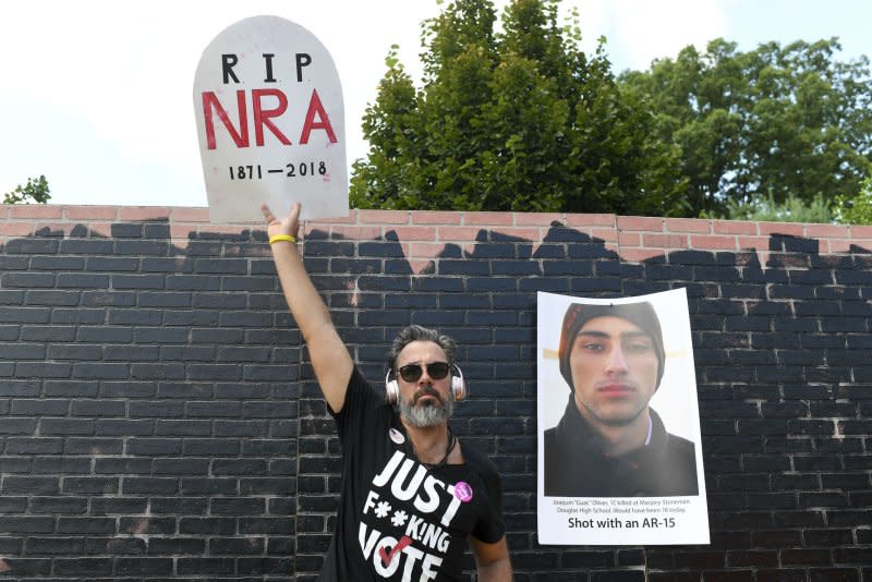 Manuel Oliver, whose son, Joaquin Oliver, was killed in the mass shooting in Parkland, Fla., participates in the National March on the NRA in 2018 in Fairfax, Va. File Photo by Leigh Vogel/UPI