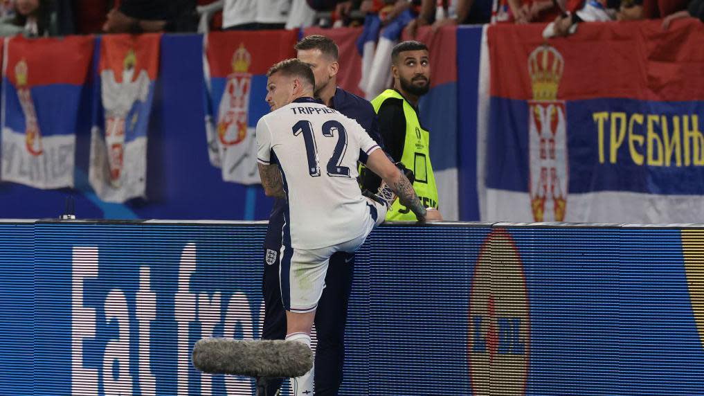 Kieran Trippier receives treatment for cramp