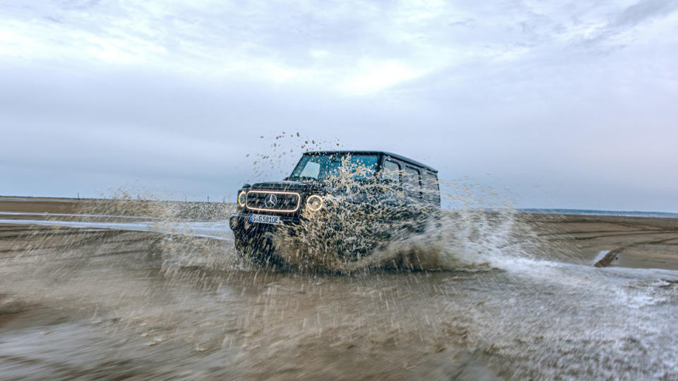 Driving the all-electric Mercedes-Benz G 580 through water.