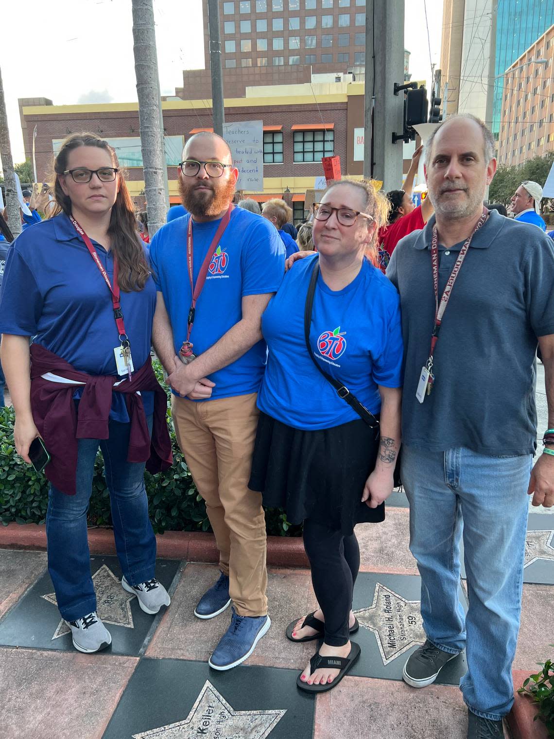 Marjory Stoneman Douglas High School teacher Melissa Falkowski stands with fellow educators Jacob Abraham, Sarah Botschmcguinn and Stewart Rabin at a rally by the Broward teachers union calling for a larger raise than the 1.7% raise offered by the district, Wednesday, Nov. 8, 2023. Amanda Geduld/ageduld@miamiherald.com