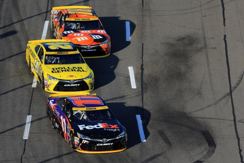 Denny Hamlin, Matt Kenseth and Kyle Busch are separated by two points. (Getty)