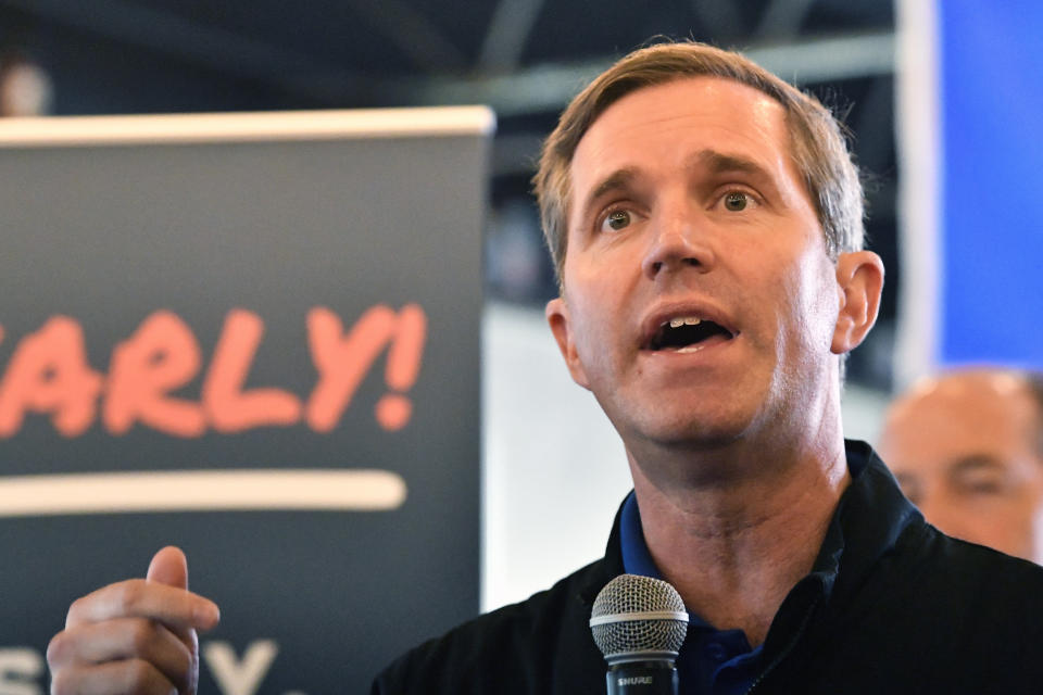Kentucky Governor and Democratic candidate for re-election Andy Beshear speaks to supporters during a stop of his statewide bus tour in Richmond, Ky., Monday, Oct. 30, 2023. (AP Photo/Timothy D. Easley)
