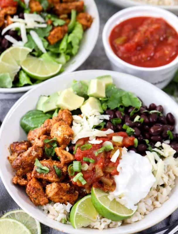 <p>Spend With Pennies</p><p>Tender chicken with zesty lime seasoning with black beans and rice! </p><p><strong>Cost: $16.81</strong></p><p><strong>Get the recipe: <a href="https://www.spendwithpennies.com/chicken-burrito-bowl/" rel="nofollow noopener" target="_blank" data-ylk="slk:Chicken Burrito Bowl;elm:context_link;itc:0;sec:content-canvas" class="link rapid-noclick-resp">Chicken Burrito Bowl</a></strong></p>