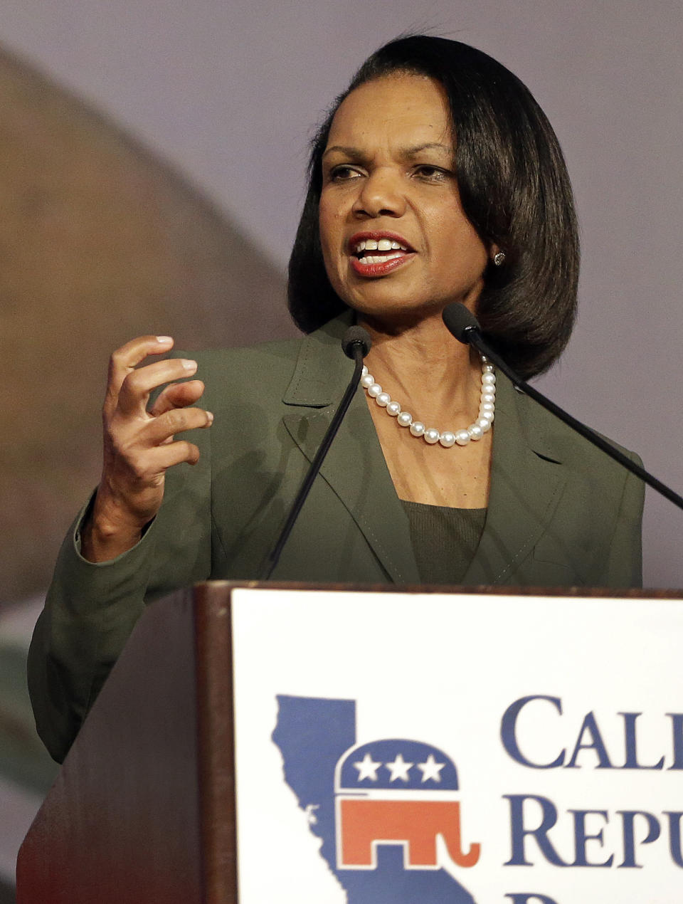 Former Secretary of State Condoleezza Rice gestures while speaking before the California Republican Party 2014 Spring Convention Saturday, March 15, 2014, in Burlingame, Calif. (AP Photo/Ben Margot)