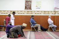 In this Oct. 18, 2019, photo, Kurds attend Friday prayers at the Salahadeen Center in Nashville, Tenn. Nashville has the largest Kurdish population in the U.S. The community of up to 40,000 Kurds has felt largely helpless to aid their homeland of late, as images of death and despair invade social media. Many feel a new level of betrayal by President Donald Trump after watching Turkey attack their people and push them out of Syria. (AP Photo/Mark Humphrey)