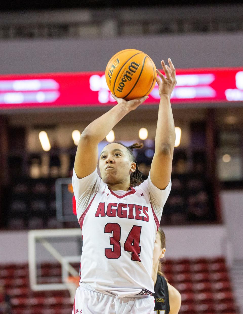 NMSU guard Tayelin Grays shoots a basket during a college basketball game on Saturday, Feb. 18, 2023, at the Pan American Center