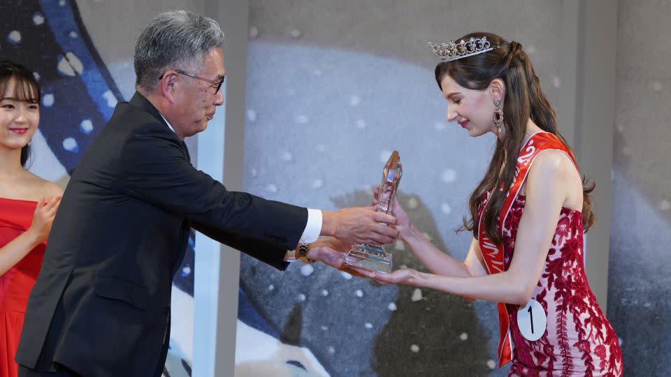 Karolina Shiino accepts the Miss Nippon trophy. - Miss Nippon