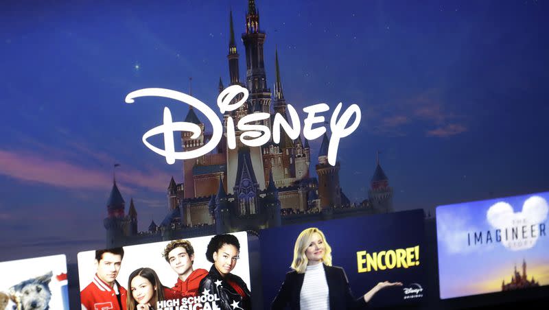 In this Wednesday, Nov. 13, 2019, file photo, a Disney logo forms part of a menu for the Disney+ movie and entertainment streaming service on a computer screen in Walpole, Mass.
