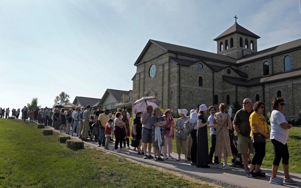 People wait to view the body of Sister Wilhelmina Lancaster at the Benedictines of Mary, Queen of Apostles abbey - AP