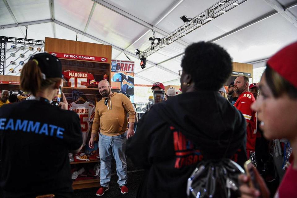 Fans posed for photos near a replica of Kansas City Chiefs quarterback Patrick Mahomes’ locker at the NFL Draft Experience Thursday, April 27, 2023, at the National WWI Museum and Memorial in Kansas City.