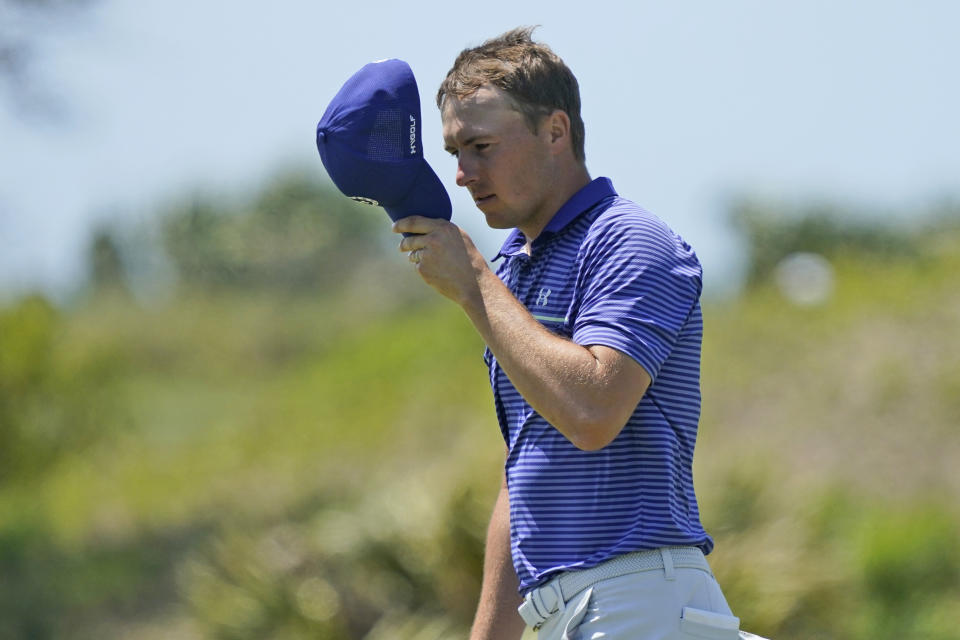 Jordan Spieth replaces his cap on the second hole during the second round of the PGA Championship golf tournament on the Ocean Course Friday, May 21, 2021, in Kiawah Island, S.C. (AP Photo/Matt York)