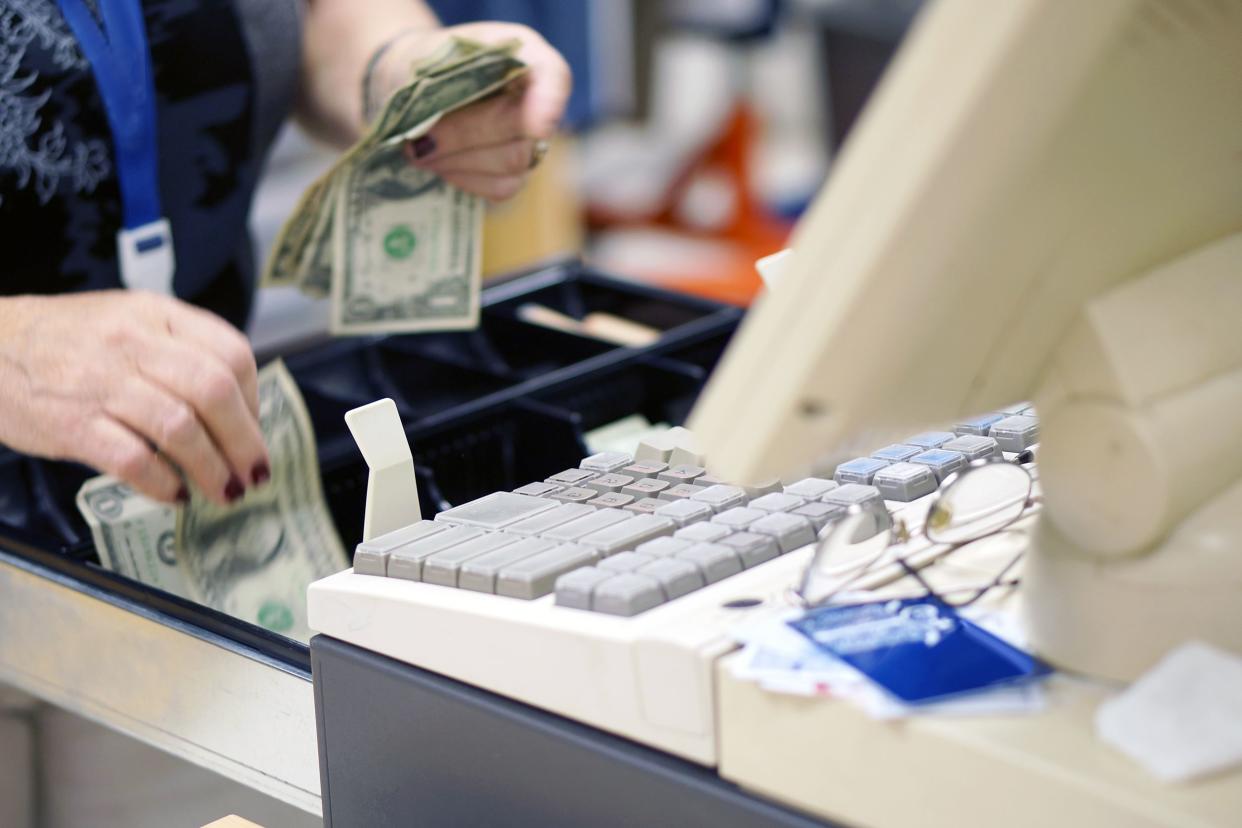 cashier giving change