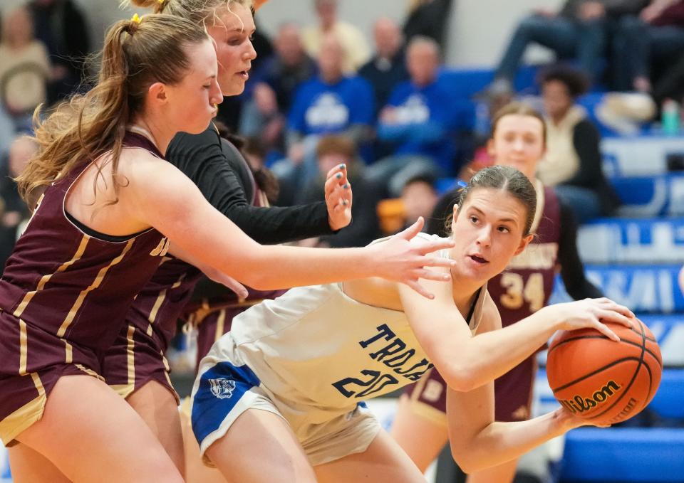 Bishop Chatard Trojans Mary Mason (20) searches to pass the ball Tuesday, Jan. 30, 2024, during the game at Bishop Chatard High School in Indianapolis.
