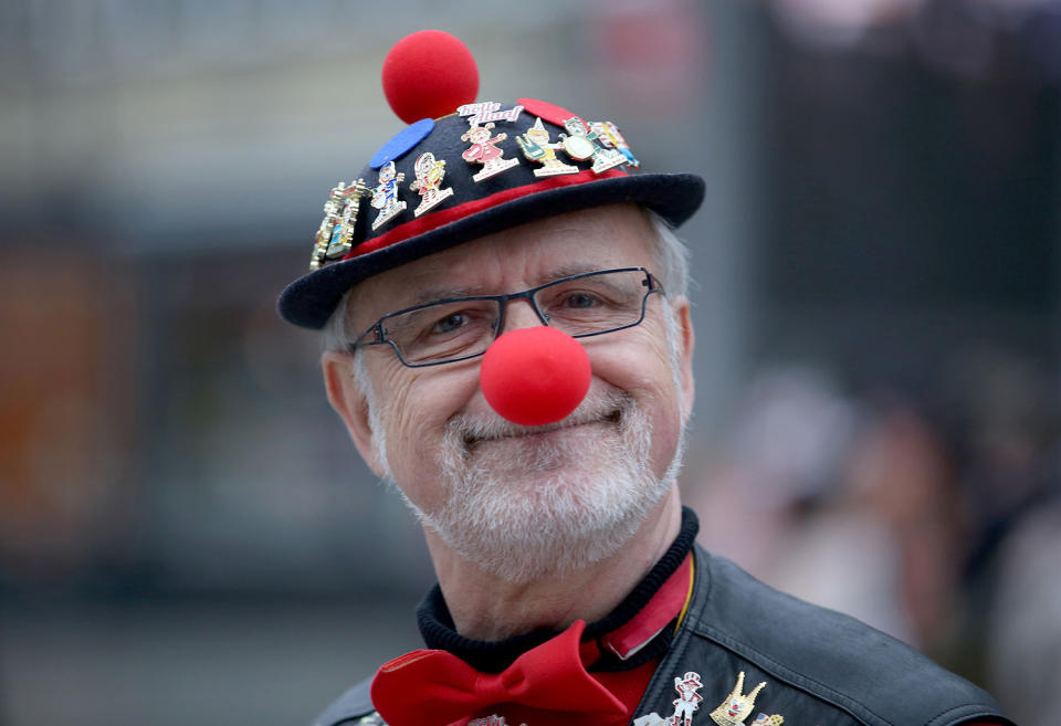 <p>A carnival reveller dressed as a clown celebrates the start of the hot season on Women’s Carnival, Feb. 23, 2017, in Cologne, western Germany. (Photo: Federico Gambarini/AFP/Getty Images) </p>